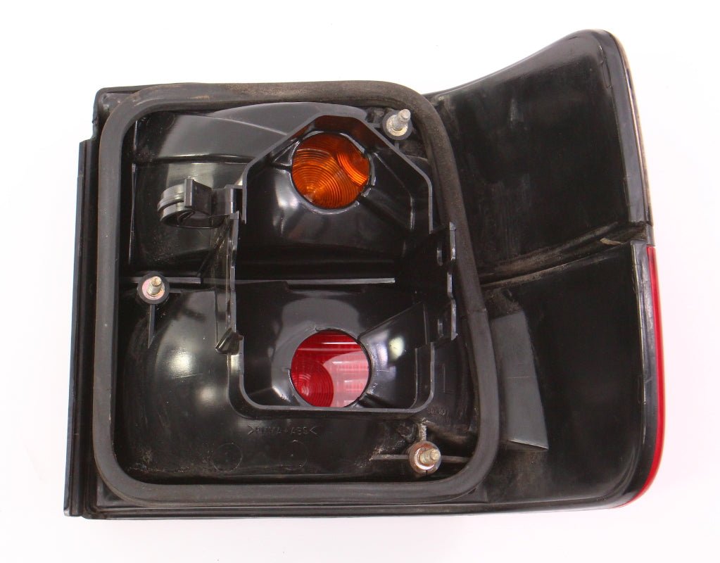 LH Outer Smoked Taillight Tail Lamp 93-99 VW Jetta GT Trek GLX MK3 - 1HM 945 095