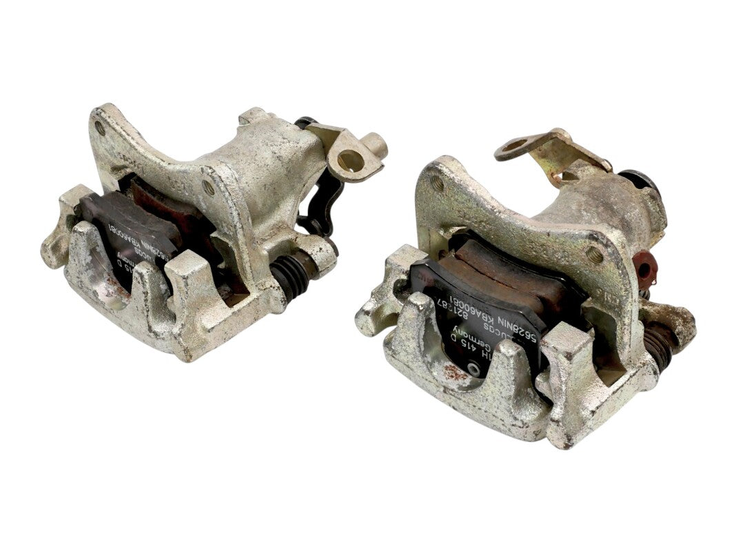 NOS Rear Disc Brake Caliper Carrier Set 93-99 VW Jetta Golf GTI Cabrio Mk3 - OEM