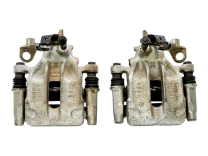 NOS Rear Disc Brake Caliper Carrier Set 93-99 VW Jetta Golf GTI Cabrio Mk3 - OEM