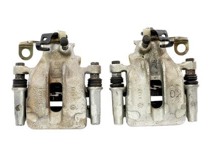 NOS Rear Disc Brake Caliper Carrier Set 93-99 VW Jetta Golf GTI Cabrio Mk3 ~ OEM